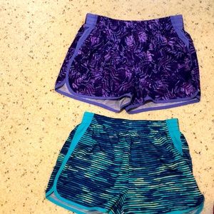 Champion kids large 10-12 purple leafy color and teal, green and blue color